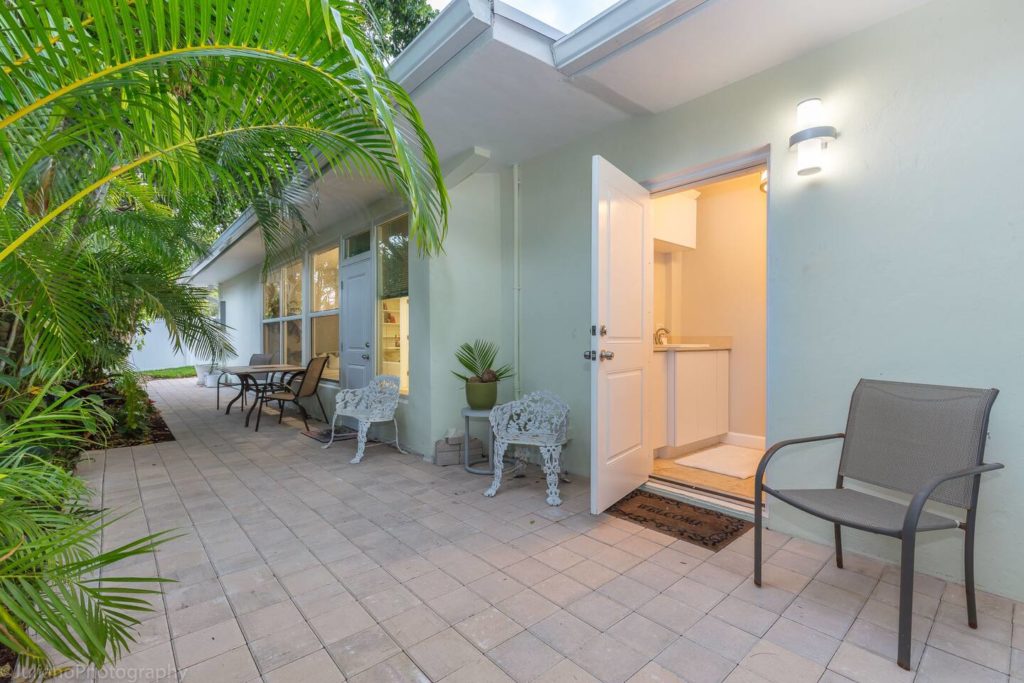 Private sitting area in back w/half-bath Cabana for cleanup when returning from beach. BBQ Grill and Hot Tub added to this back area. See pictures.