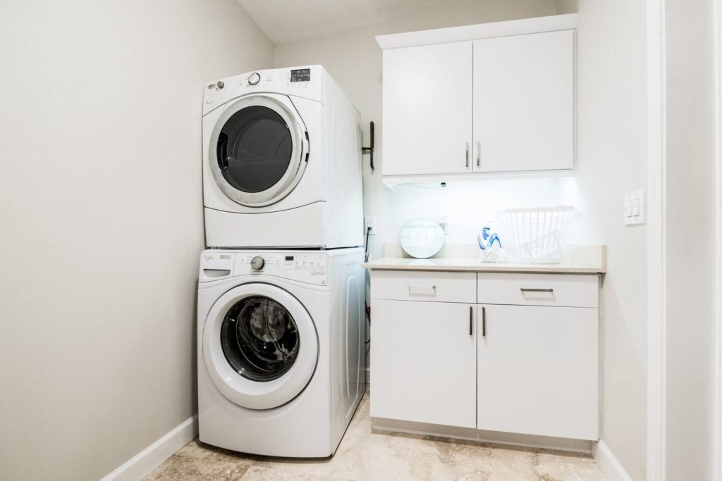 Laundry room adjacent to Master bedroom.