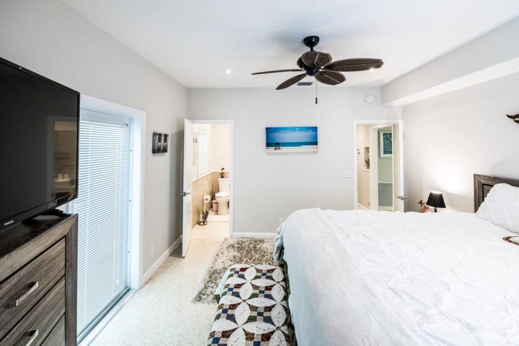 View form laundry room leading to private master bathroom.