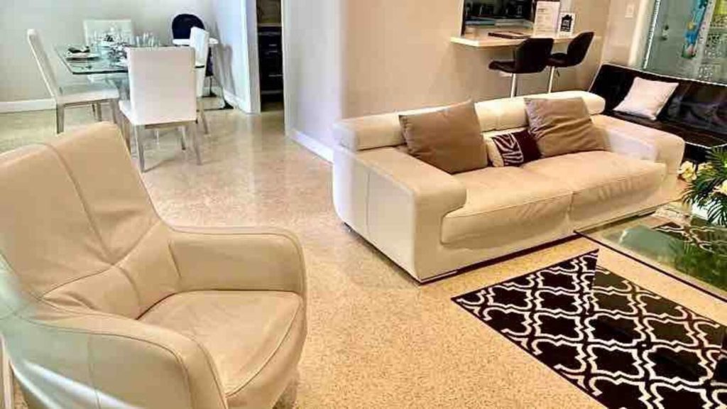 Recently added a white leather chair to living room.